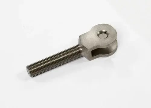 Stainless steel clevis bolt with threaded shank and slotted yoke end with cross-hole, on white background.